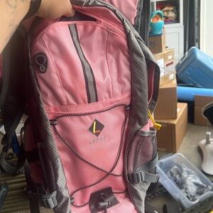 Camel back. Pink. Like new.